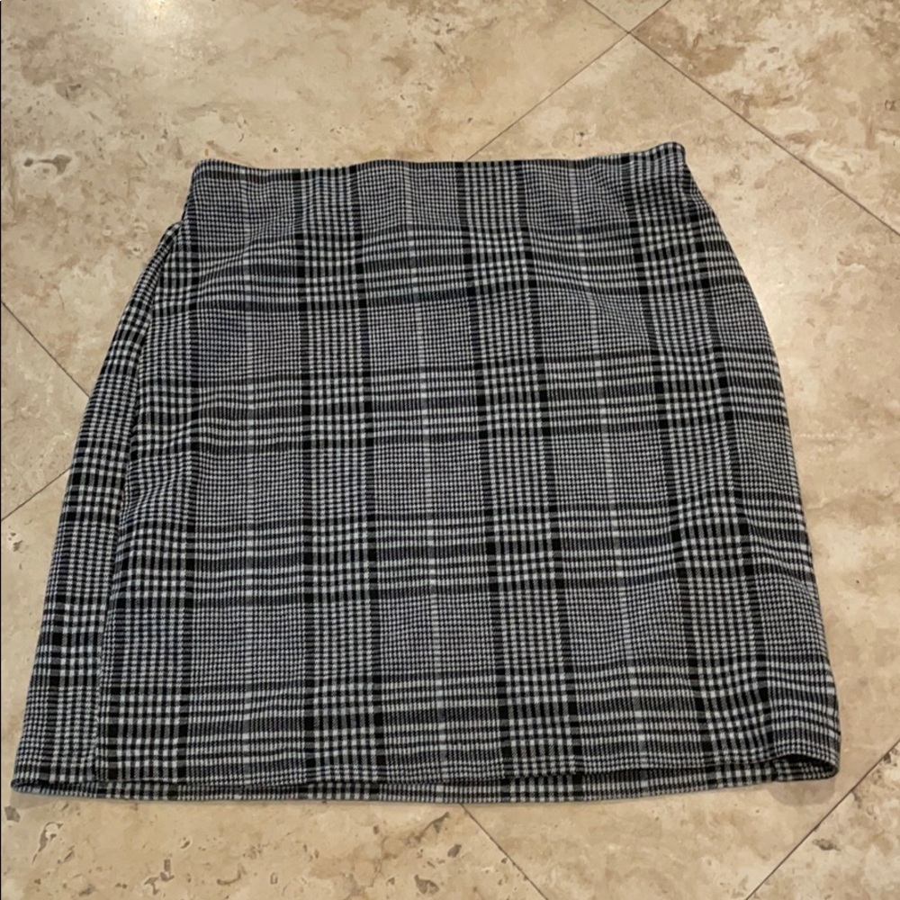 Worn twice Plaid skirt, very stretchy